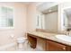 Cozy bathroom with vanity, decorative countertop, and well lit space at 3643 Calabria Avenue, Davenport, FL 33897