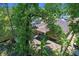 An aerial view shows the location of the home with mature landscaping and backyard banana trees at 3795 Rachel St, Apopka, FL 32703