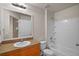 Bathroom features a single sink vanity, tub/shower combo, and tile floors at 3795 Rachel St, Apopka, FL 32703