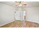 Bedroom with two doorways and wood-look floors at 3795 Rachel St, Apopka, FL 32703