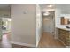 Inviting entryway featuring tile flooring and a decorative stone-accented breakfast bar, leading into the home's living spaces at 3795 Rachel St, Apopka, FL 32703