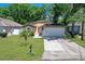 Charming single-story home with a well-maintained lawn and landscaping at 3795 Rachel St, Apopka, FL 32703
