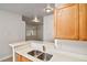 Bright kitchen featuring stainless steel appliances, a double sink, and a breakfast bar for casual dining at 3795 Rachel St, Apopka, FL 32703