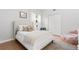 Cozy bedroom with a plush bed, soft lighting, and comfortable decor at 3891 Brantley Place Cir, Apopka, FL 32703