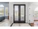 Inviting foyer featuring glass paneled front doors and marble floors at 3891 Brantley Place Cir, Apopka, FL 32703