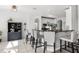 Modern kitchen with a breakfast bar, stylish cabinetry, and ample counter space for meal preparation at 3891 Brantley Place Cir, Apopka, FL 32703