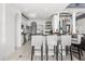 Well-appointed kitchen with a breakfast bar, stainless steel appliances, and ample storage space at 3891 Brantley Place Cir, Apopka, FL 32703