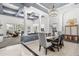 Spacious dining and living areas connected with decorative columns at 3891 Brantley Place Cir, Apopka, FL 32703