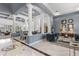 Spacious living room with high ceilings, elegant columns, and marble floors at 3891 Brantley Place Cir, Apopka, FL 32703