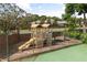 Enclosed playset area with multiple play structures and a secure fence, offering a safe recreational space at 3891 Brantley Place Cir, Apopka, FL 32703