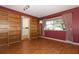 Cozy bedroom with built-in bookshelves and bright natural light at 4141 Fallwood Cir, Orlando, FL 32812