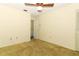 Spacious bedroom with neutral walls and ceiling fan at 4141 Fallwood Cir, Orlando, FL 32812
