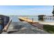 Boat ramp and wooden dock on a tranquil lake at 4141 Fallwood Cir, Orlando, FL 32812