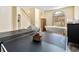 Bonus room includes a ping pong table and massage table. Staircase is visible to the left at 4751 Aguila Pl, Orlando, FL 32826