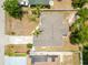 Birds eye view of home showing roof, driveway, yard, and neighboring houses at 514 Richmond Ave, Deltona, FL 32725