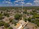 Aerial view showing home's location within a beautiful residential neighborhood and lake at 514 Richmond Ave, Deltona, FL 32725