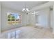 Open-concept living area with tiled floors, natural light and modern feel at 514 Richmond Ave, Deltona, FL 32725