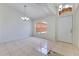 Bright living area with tile floors and chandelier at 514 Richmond Ave, Deltona, FL 32725