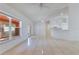 Open living room features tile flooring and seamless flow to kitchen at 514 Richmond Ave, Deltona, FL 32725