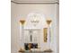 View of a bar area through an arched opening, framed by decorative pillars and featuring a chandelier at 6139 Greatwater Dr, Windermere, FL 34786