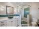 Bathroom featuring a modern vanity, vessel sink, and tiled shower at 6139 Greatwater Dr, Windermere, FL 34786