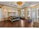 Luxurious bedroom featuring hardwood floors, decorative ceilings and lots of natural light at 6139 Greatwater Dr, Windermere, FL 34786