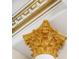 Close up on a gold decorative column with ornate architectural details at 6139 Greatwater Dr, Windermere, FL 34786
