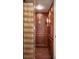 Elevator with ornamental gold gate, wood paneled walls, and vintage details at 6139 Greatwater Dr, Windermere, FL 34786