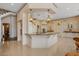 Expansive kitchen island with custom cabinetry and ample counter space at 6139 Greatwater Dr, Windermere, FL 34786