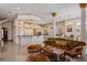Open concept living room connecting to the kitchen, featuring a grand design at 6139 Greatwater Dr, Windermere, FL 34786