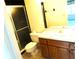 This bathroom features a vanity, toilet, shower with a black door at 672 Post Oak Cir # 106, Altamonte Springs, FL 32701