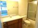 Standard bathroom features a tub, vanity, standard toilet and neutral color palette at 672 Post Oak Cir # 106, Altamonte Springs, FL 32701