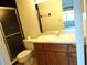Functional bathroom featuring a glass-enclosed shower and a vanity with storage at 672 Post Oak Cir # 106, Altamonte Springs, FL 32701