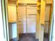 Spacious walk-in closet boasts ample shelving and hanging space for maximum storage at 672 Post Oak Cir # 106, Altamonte Springs, FL 32701