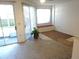 Living area with sliding door access and a charming window seat at 672 Post Oak Cir # 106, Altamonte Springs, FL 32701