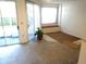 Living area with sliding door access and a charming window seat at 672 Post Oak Cir # 106, Altamonte Springs, FL 32701