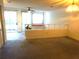 Bright living room with sliding glass doors and natural light throughout at 672 Post Oak Cir # 106, Altamonte Springs, FL 32701