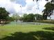 Well-maintained community tennis courts with fencing and green surroundings at 672 Post Oak Cir # 106, Altamonte Springs, FL 32701