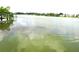 Scenic view of lakefront property, providing direct water access and stunning natural views at 672 Post Oak Cir # 106, Altamonte Springs, FL 32701