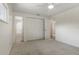 Spacious carpeted bedroom featuring a closet, ceiling fan and an ensuite bathroom at 891 N Wayman St, Longwood, FL 32750