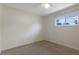 Bedroom with carpet flooring and bright window at 891 N Wayman St, Longwood, FL 32750