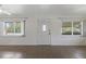 Bright and airy living room with tile flooring and neutral walls with abundant natural light at 891 N Wayman St, Longwood, FL 32750