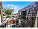 Balcony with dark railing and views of the parking area at 917 Royal Oak Blvd, Leesburg, FL 34748