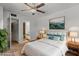 Well-lit bedroom featuring a neutral color palette and decor at 917 Royal Oak Blvd, Leesburg, FL 34748
