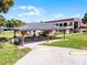 Community picnic area under a gazebo next to the pool at 917 Royal Oak Blvd, Leesburg, FL 34748