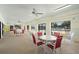 Community clubhouse with tables and pool views at 917 Royal Oak Blvd, Leesburg, FL 34748