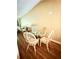 Cozy dining area featuring a glass-top table and rattan chairs at 963 Stucki Ter, Winter Garden, FL 34787
