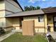 Charming townhouse features a fenced front yard and freshly painted exterior at 963 Stucki Ter, Winter Garden, FL 34787