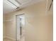 Walk-in closet with open doorway to bathroom at 10097 Lake District Ln, Orlando, FL 32832