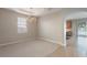 Neutral dining area with elegant chandelier and window at 10097 Lake District Ln, Orlando, FL 32832